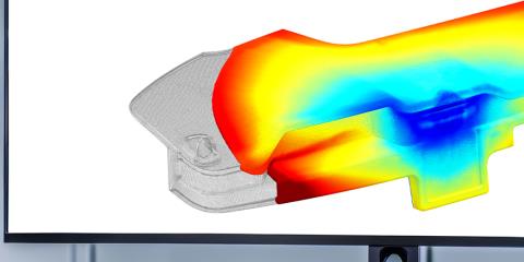 Engineer in front of a large screen