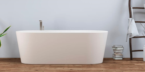 Bathroom interior with self-standing and decoration on hardwood floor. Empty white wall with copy space in the background. 3D rendered image.